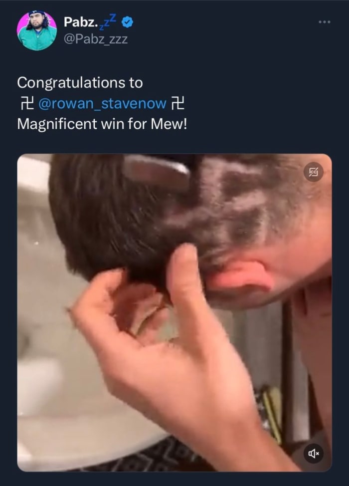Winner at Pokemon regional with Swastika in hair